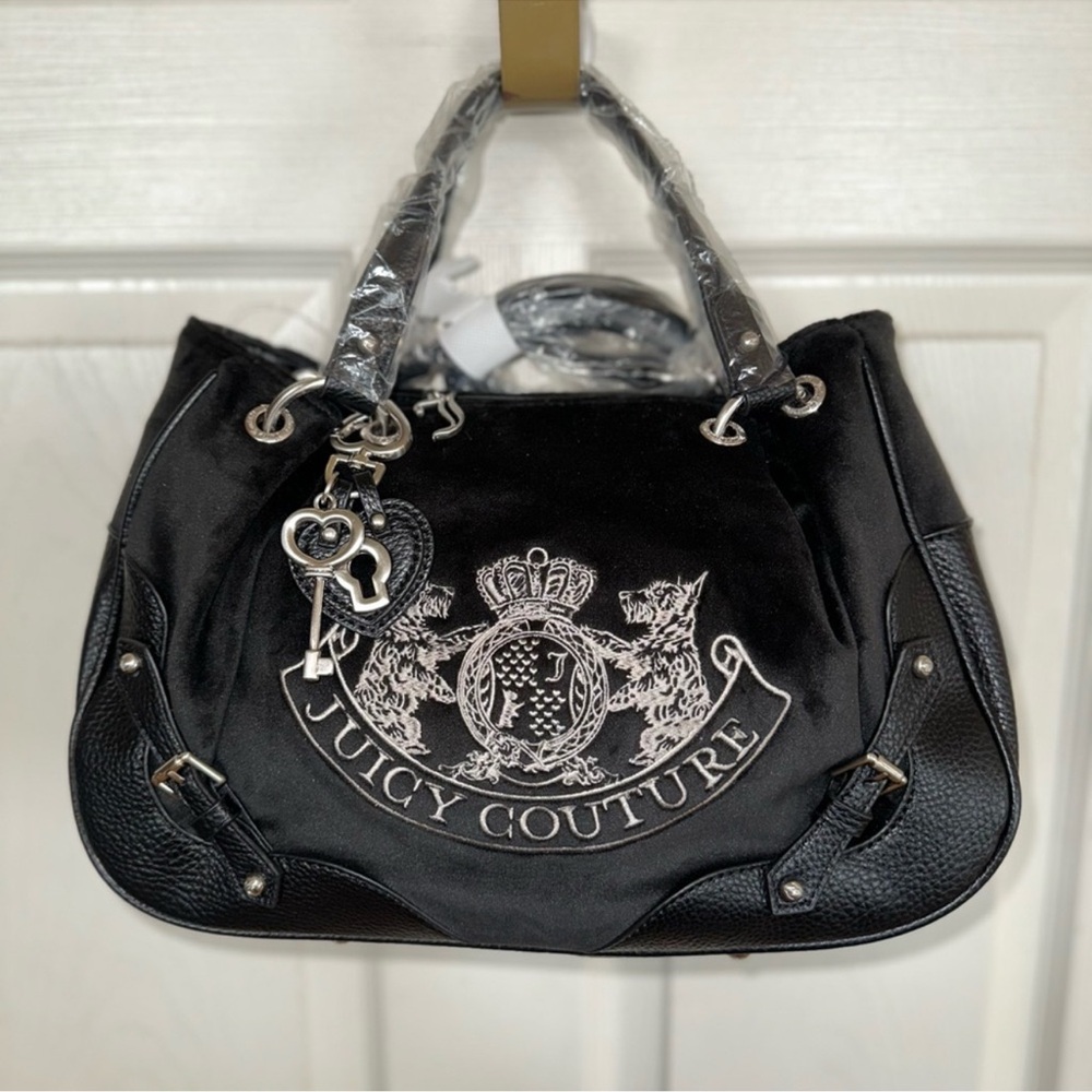 Juicy Couture black twig dog dumpling bag with silver hardware New with Tags